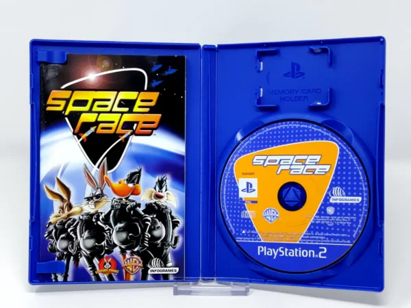 Interior del juego Looney Tunes: Space Race (ITA) para PlayStation 2 con disco y manual