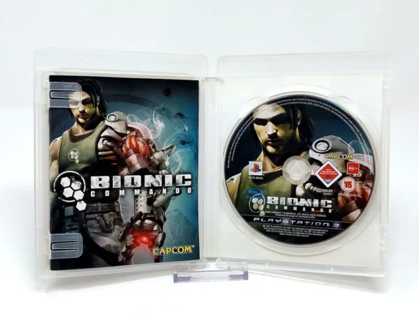 Interior del juego Bionic Commando (ESP) para PlayStation 3 con disco y manual