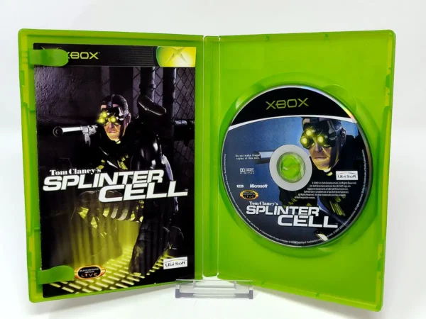 Interior del juego Tom Clancy's Splinter Cell (ESP) para XBOX con disco y manual