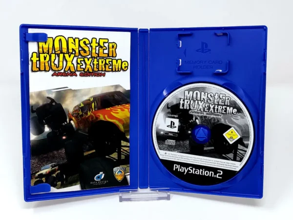 Interior del juego Monster Trux Extreme: Arena Edition (ESP) para PlayStation 2 con disco y manual