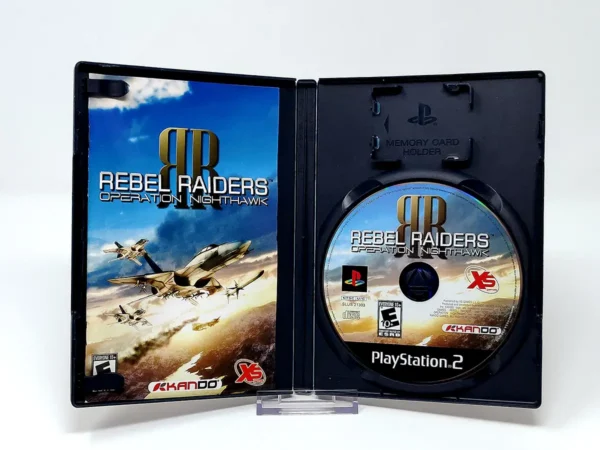 Interior del juego Rebel Raiders: Operation Nighthawk (USA) para PlayStation 2 con disco y manual
