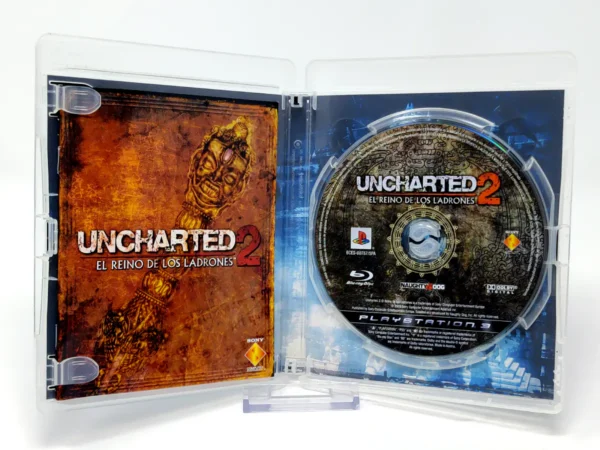 Interior del juego Uncharted 2: Among Thieves (ESP) para PlayStation 3 con disco y manual