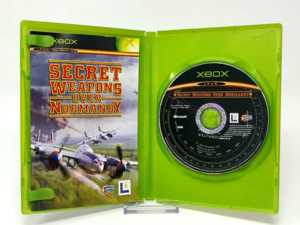 Interior del juego Secret Weapons over Normandy (FRA) para XBOX con disco y manual