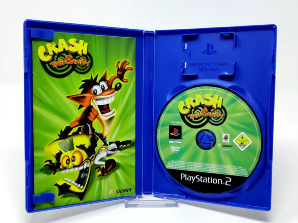 Interior del juego Crash Twinsanity (ESP) para PlayStation 2 con disco y manual