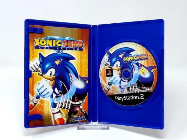 Interior del juego Sonic Gems Collection (ESP) para PlayStation 2 con disco y manual