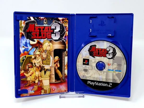 Interior del juego Metal Slug 3 (ESP) para PlayStation 2 con disco y manual