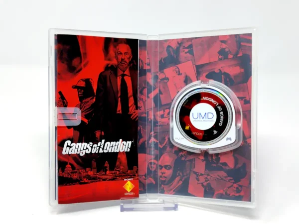 Interior del juego Gangs of London (ESP) para PSP con disco y manual