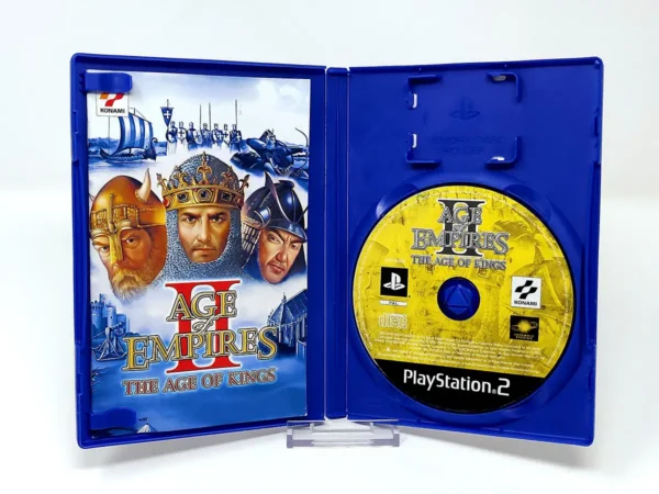 Interior del juego Age of Empires II: The Age of Kings (ESP) para PlayStation 2 con disco y manual