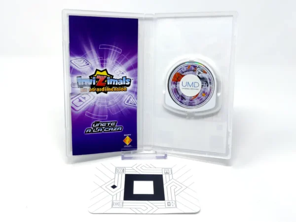 Interior del juego Invizimals: La Otra Dimension (ESP) (Essentials) para PSP con disco y manual
