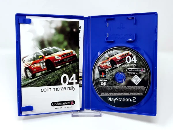 Interior del juego Colin McRae Rally 04 (ESP) para PlayStation 2 con disco y manual