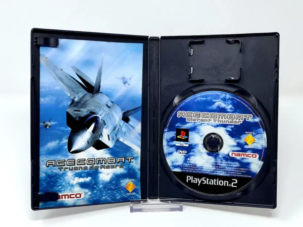 Interior del juego Ace Combat: Trueno de Acero (ESP) para PlayStation 2 con disco y manual