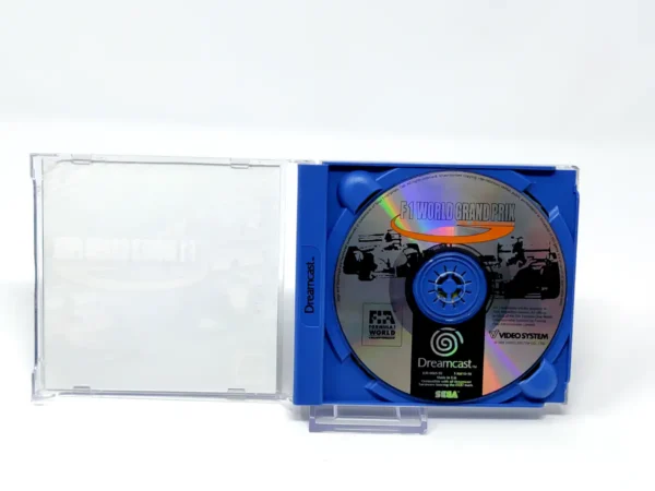 Interior del juego F1 World Grand Prix (ESP) para Sega Dreamcast con disco y manual