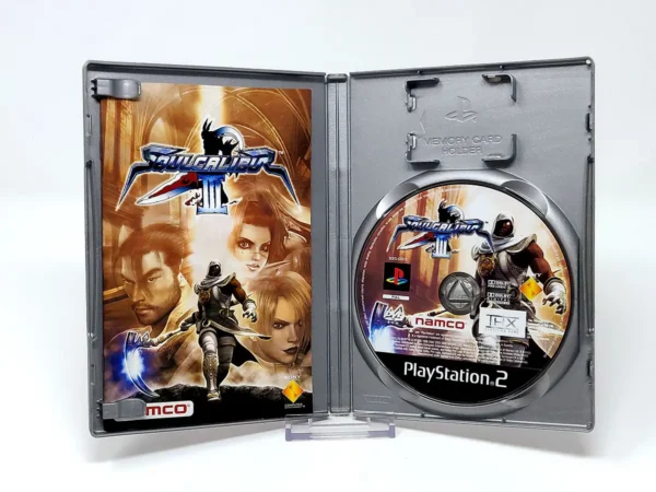 Interior del juego Soulcalibur III (FRA) (Platinum) para PlayStation 2 con disco y manual