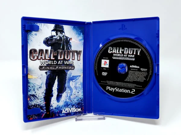 Interior del juego Call of Duty: World at War: Final Fronts (ESP) para PlayStation 2 con disco y manual