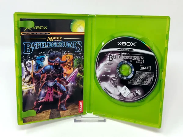 Interior del juego Magic: The Gathering: Battlegrounds (ESP) para XBOX con disco y manual