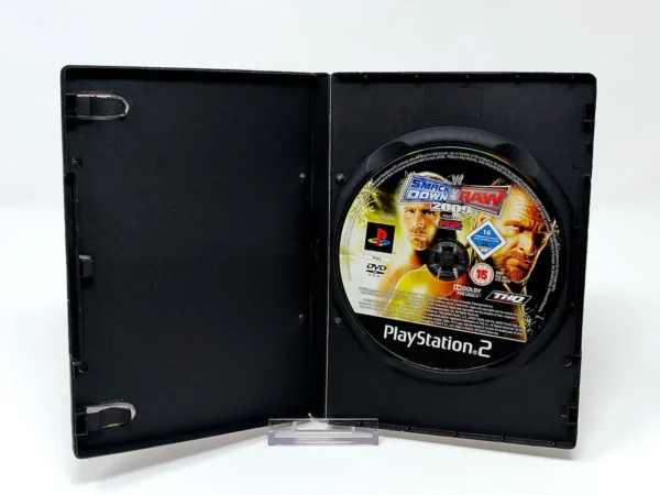 Interior del juego WWE SmackDown vs. Raw 2009 (ESP) (Rebajado) para PlayStation 2 con disco y manual