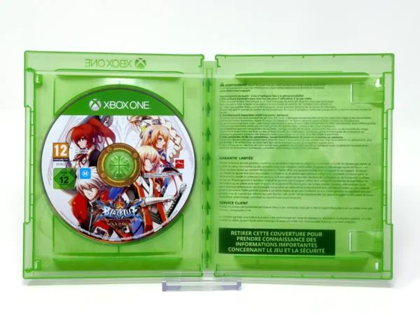 Interior del juego BlazBlue: Chrono Phantasma Extend (FRA) para XBOX One / Series X/S con disco y manual