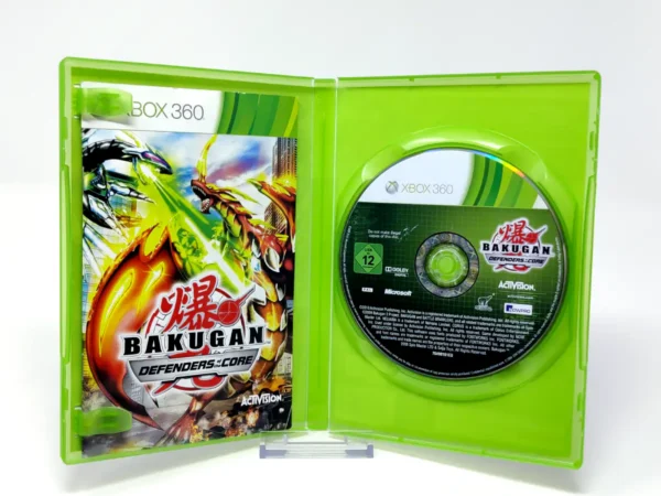 Interior del juego Bakugan: Defenders of the Core (ESP) para XBOX 360 con disco y manual