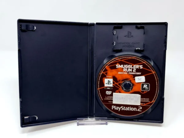 Interior del juego Smuggler's Run 2: Hostile Territory (FRA) (Rebajado) para PlayStation 2 con disco y manual