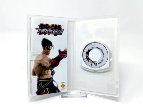Interior del juego Tekken: Dark Resurrection (ESP) (Essentials) para PSP con disco y manual
