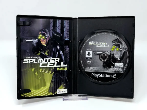 Interior del juego Tom Clancy's Splinter Cell (ESP) para PlayStation 2 con disco y manual