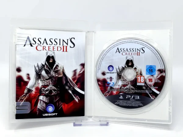 Interior del juego Assassin's Creed II (ESP) (v2) para PlayStation 3 con disco y manual