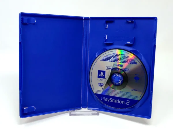 Interior del juego SingStar Rocks! (ESP) (Promo) para PlayStation 2 con disco y manual