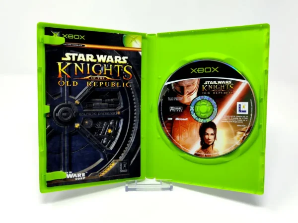 Interior del juego Star Wars: Knights of the Old Republic (UK) para XBOX con disco y manual