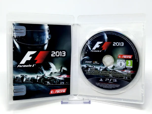 Interior del juego F1 2013 (ESP) para PlayStation 3 con disco y manual