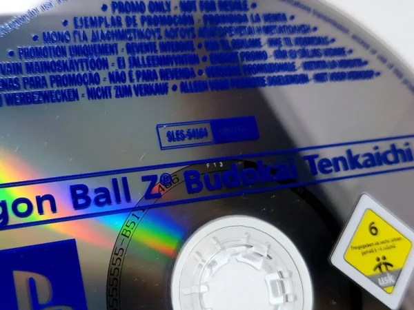 Interior del juego Dragon Ball Z: Budokai Tenkaichi 2 (ESP) (Promo) para PlayStation 2 con disco y manual