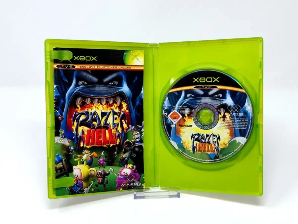 Interior del juego Raze's Hell (ESP) para XBOX con disco y manual