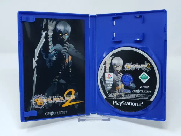 Interior del juego Shin Megami Tensei: Digital Devil Saga 2 (ESP) para PlayStation 2 con disco y manual