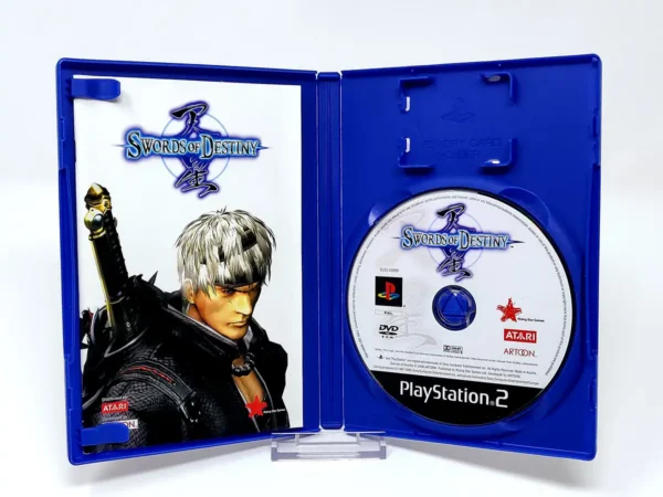 Interior del juego Swords of Destiny (ESP) para PlayStation 2 con disco y manual