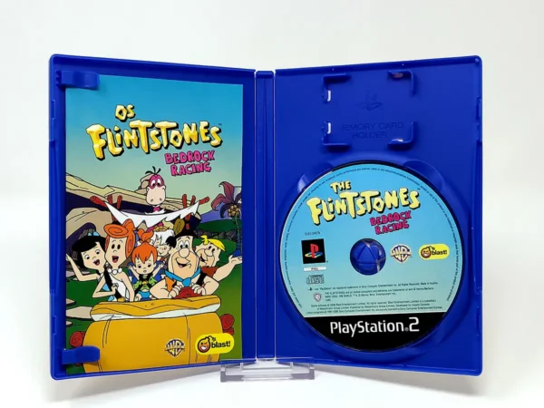 Interior del juego Os Flintstones: Bedrock Racing (POR) para PlayStation 2 con disco y manual