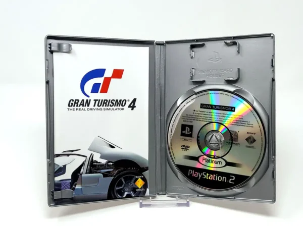 Interior del juego Gran Turismo 4 (ESP) (Platinum) para PlayStation 2 con disco y manual