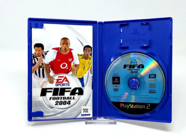 Interior del juego FIFA Football 2004 (ESP) para PlayStation 2 con disco y manual