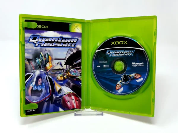 Interior del juego Quantum Redshift (UK) para XBOX con disco y manual