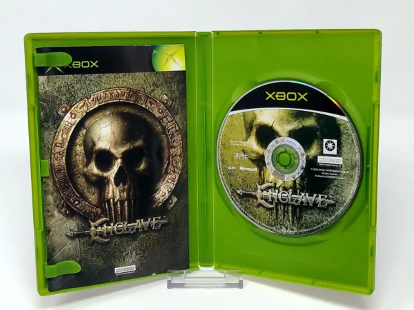 Interior del juego Enclave (ESP) para XBOX con disco y manual