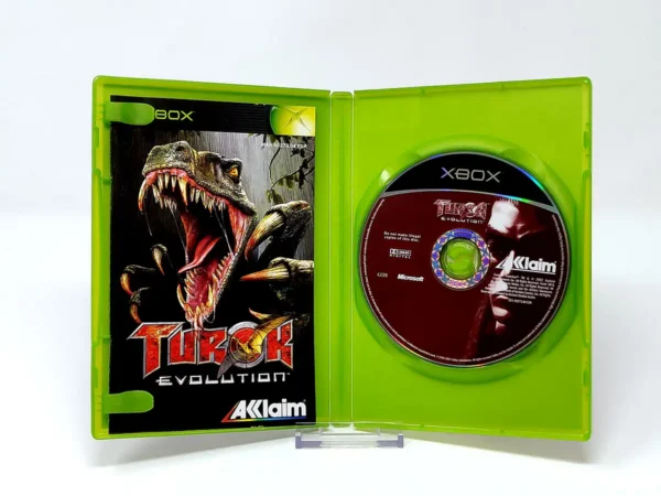 Interior del juego Turok: Evolution (ESP) para XBOX con disco y manual