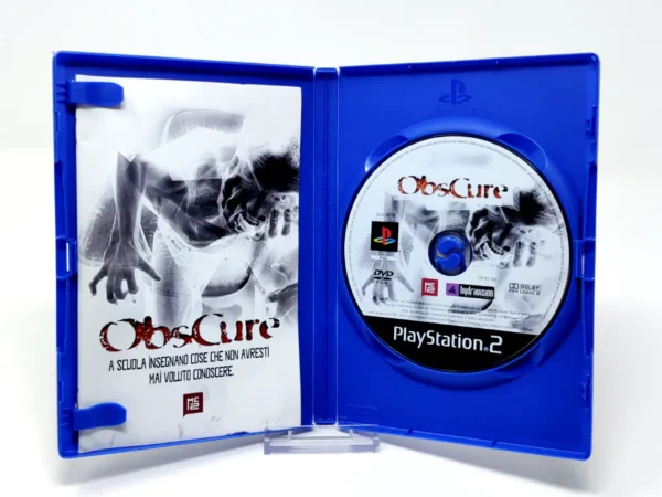 Interior del juego Obscure (ITA) para PlayStation 2 con disco y manual
