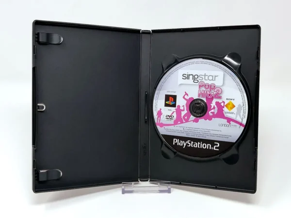 Interior del juego SingStar Pop Hits 2 (FRA) (Rebajado) para PlayStation 2 con disco y manual