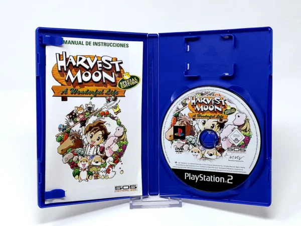 Interior del juego Harvest Moon: A Wonderful Life (Special Edition) (ESP) para PlayStation 2 con disco y manual