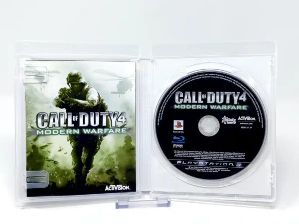Interior del juego Call of Duty 4: Modern Warfare (GOTY) (ESP) para PlayStation 3 con disco y manual