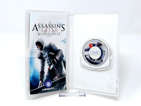 Interior del juego Assassin's Creed: Bloodlines (ESP) (Essentials) para PSP con disco y manual
