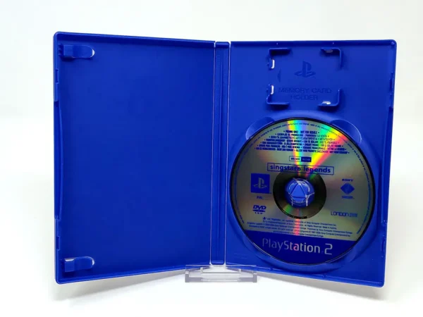 Interior del juego SingStar Legends (ESP) (Promo) para PlayStation 2 con disco y manual