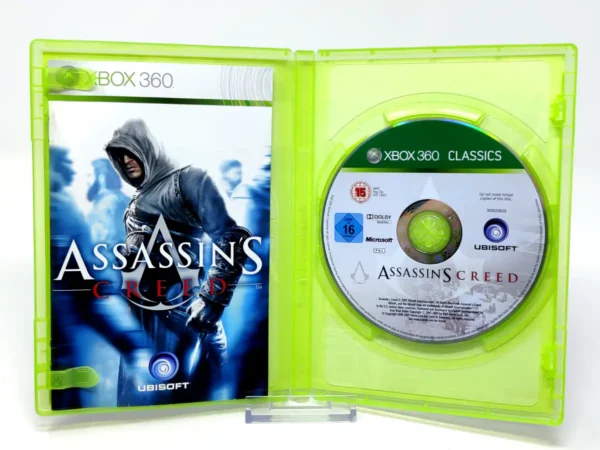 Interior del juego Assassin's Creed (ALE) (Classics) para XBOX 360 con disco y manual