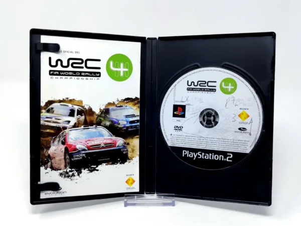 Interior del juego WRC 4: El Juego Oficial del FIA World Rally Championship (ESP) para PlayStation 2 con disco y manual