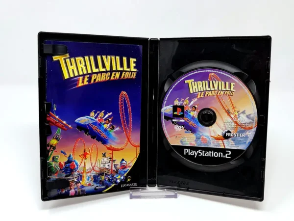 Interior del juego Thrillville: Le Parc en Folie (FRA) para PlayStation 2 con disco y manual