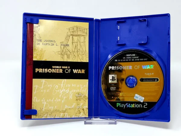Interior del juego Prisoner of War (UK) para PlayStation 2 con disco y manual