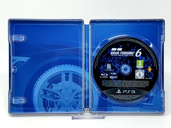 Interior del juego Gran Turismo 6 (Edición Aniversario) (ESP) (Rebajado) para PlayStation 3 con disco y manual